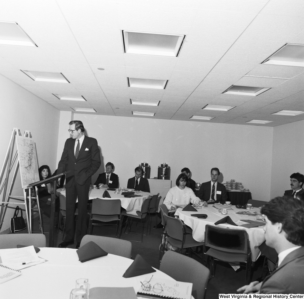 ["Senator John D. (Jay) Rockefeller looks at a map of the Eastern United States during an Appalachian Regional Commission event."]%