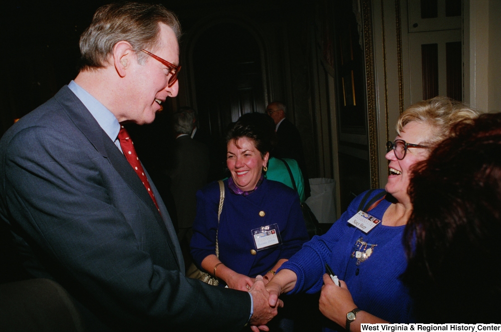 ["Senator John D. (Jay) Rockefeller shakes hands with a healthcare professional during the Celebrating Telemedicine conference in Washington."]%