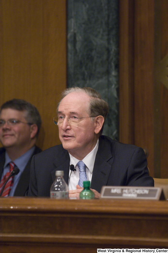 ["Senator John D. (Jay) Rockefeller sits and listens to testimony at a Commerce Committee hearing."]%