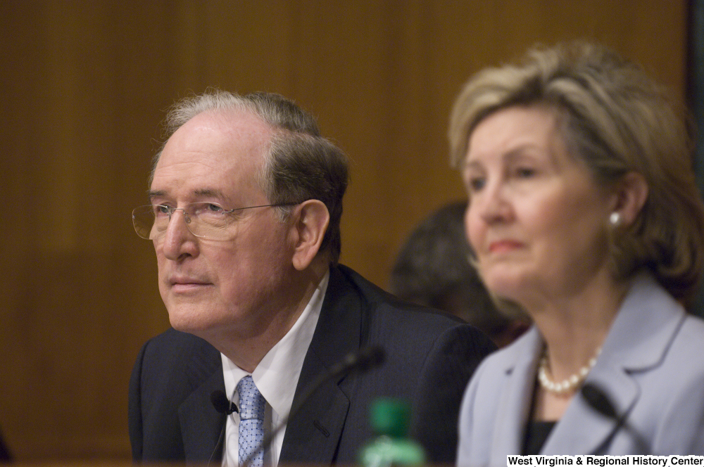 ["Senator John D. (Jay) Rockefeller and Senator Kay Hutchison listen to testimony at a Commerce Committee hearing."]%