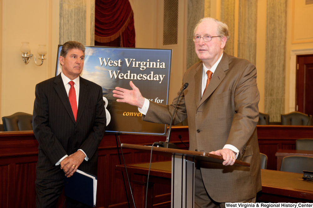 ["Senator John D. (Jay) Rockefeller speaks beside Senator Manchin at a West Virginia Wednesday event in the Senate."]%