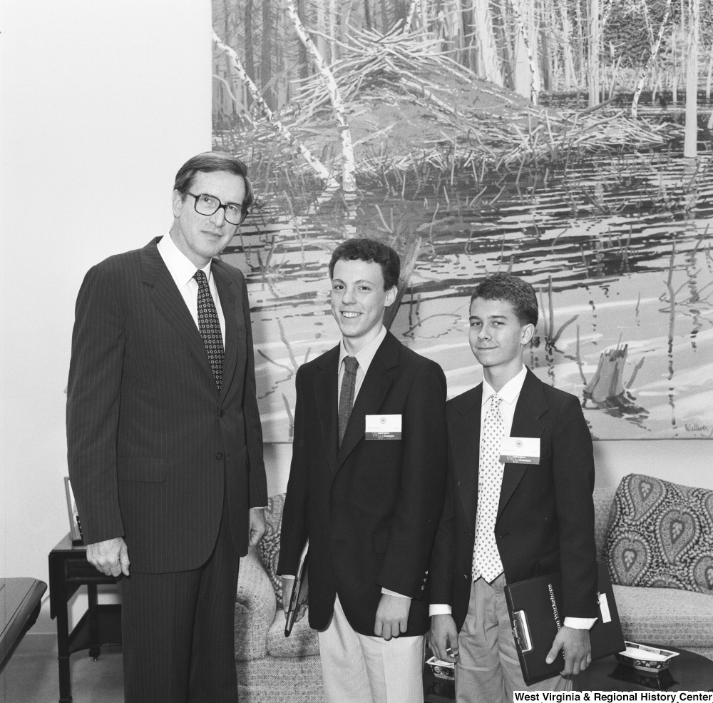["Two young participants in Washington Workshops stand next to Senator John D. (Jay) Rockefeller in his office. This program provides experience-based civic learning opportunities to high achieving students."]%