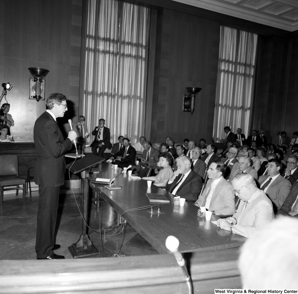 ["Senator John D. (Jay) Rockefeller addresses the audience at a Senate committee hearing."]%