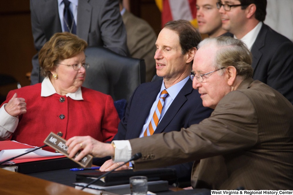 ["Senators John D. (Jay) Rockefeller, Ron Wyden, and Barbara Mikulski talk during the nomination hearing for General David Petraeus as the new Director of the Central Intelligence Agency."]%