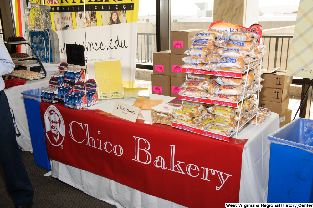 ["The Chico Bakery table sits at the 150th birthday celebration for West Virginia."]%