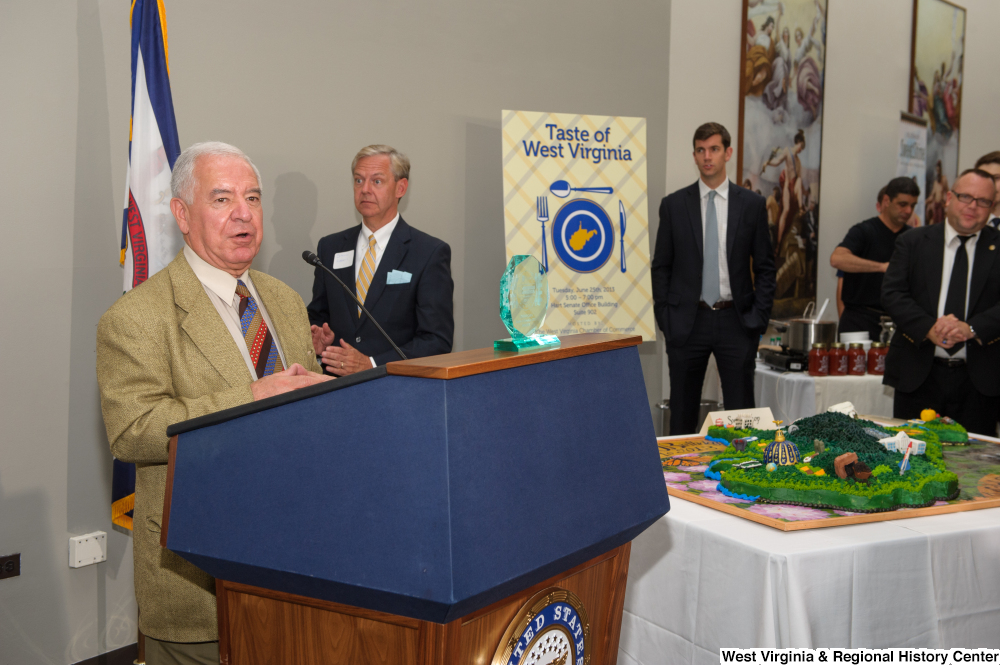 ["Representative Nick Rahall speaks at the 150th birthday celebration for West Virginia."]%