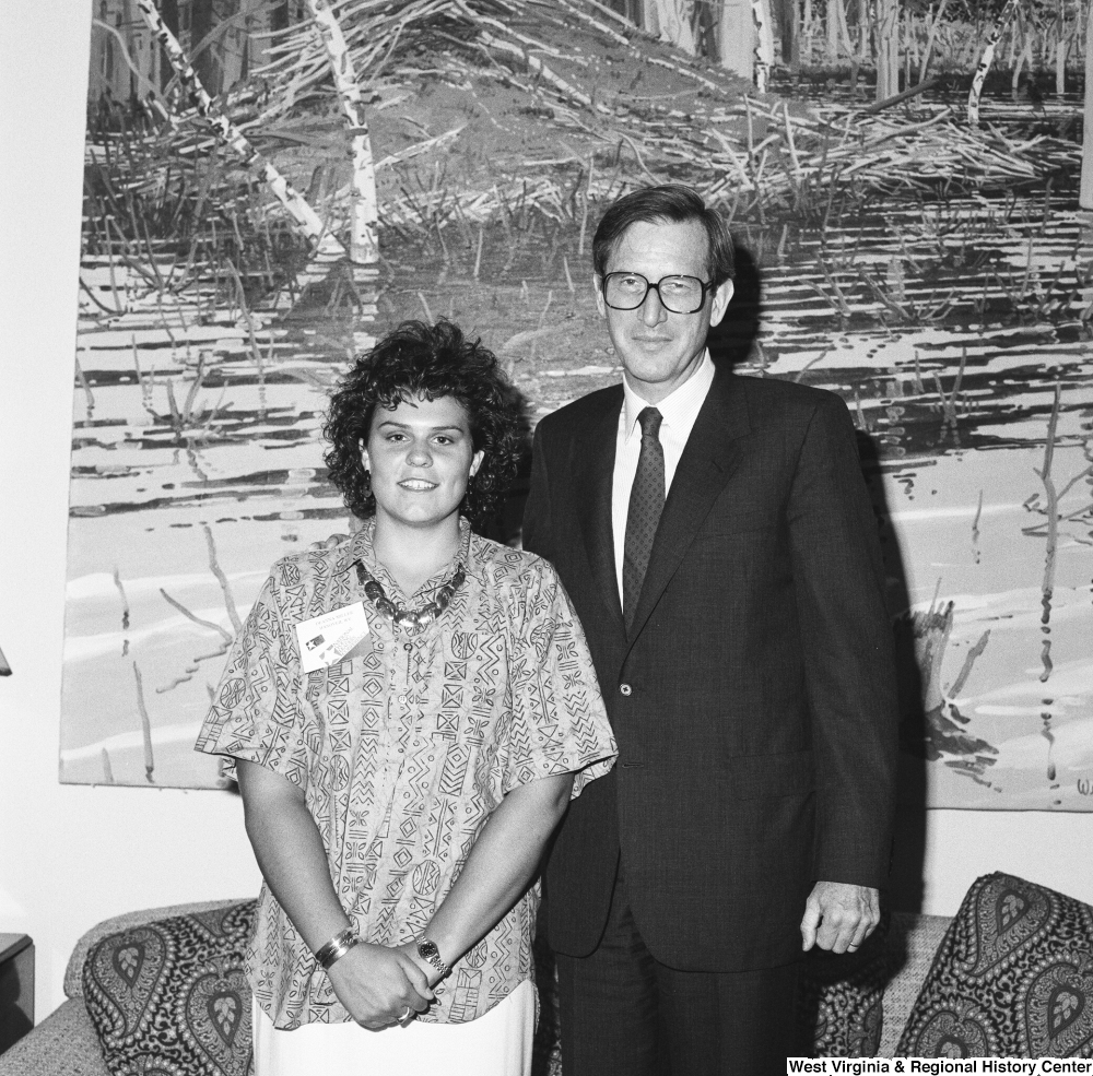 ["Senator John D. (Jay) Rockefeller stands next to a participant of the National Young Leaders Conference."]%