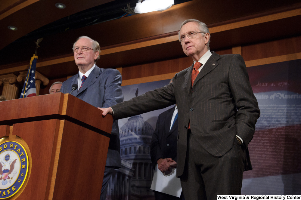["Senators John D. (Jay) Rockefeller and Harry Reid speak at a Commerce Committee press event."]%