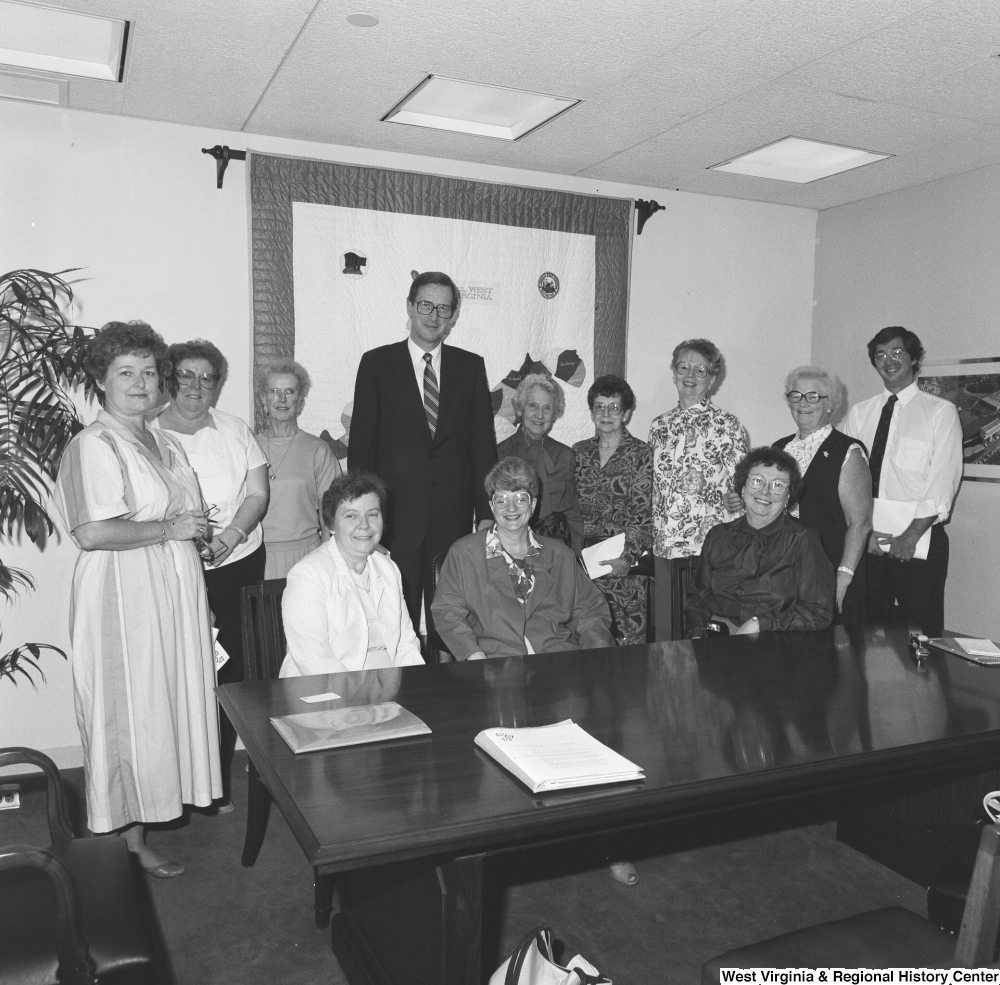 ["Senator John D. (Jay) Rockefeller stands with an unidentified group of West Virginia United Methodist Church members."]%