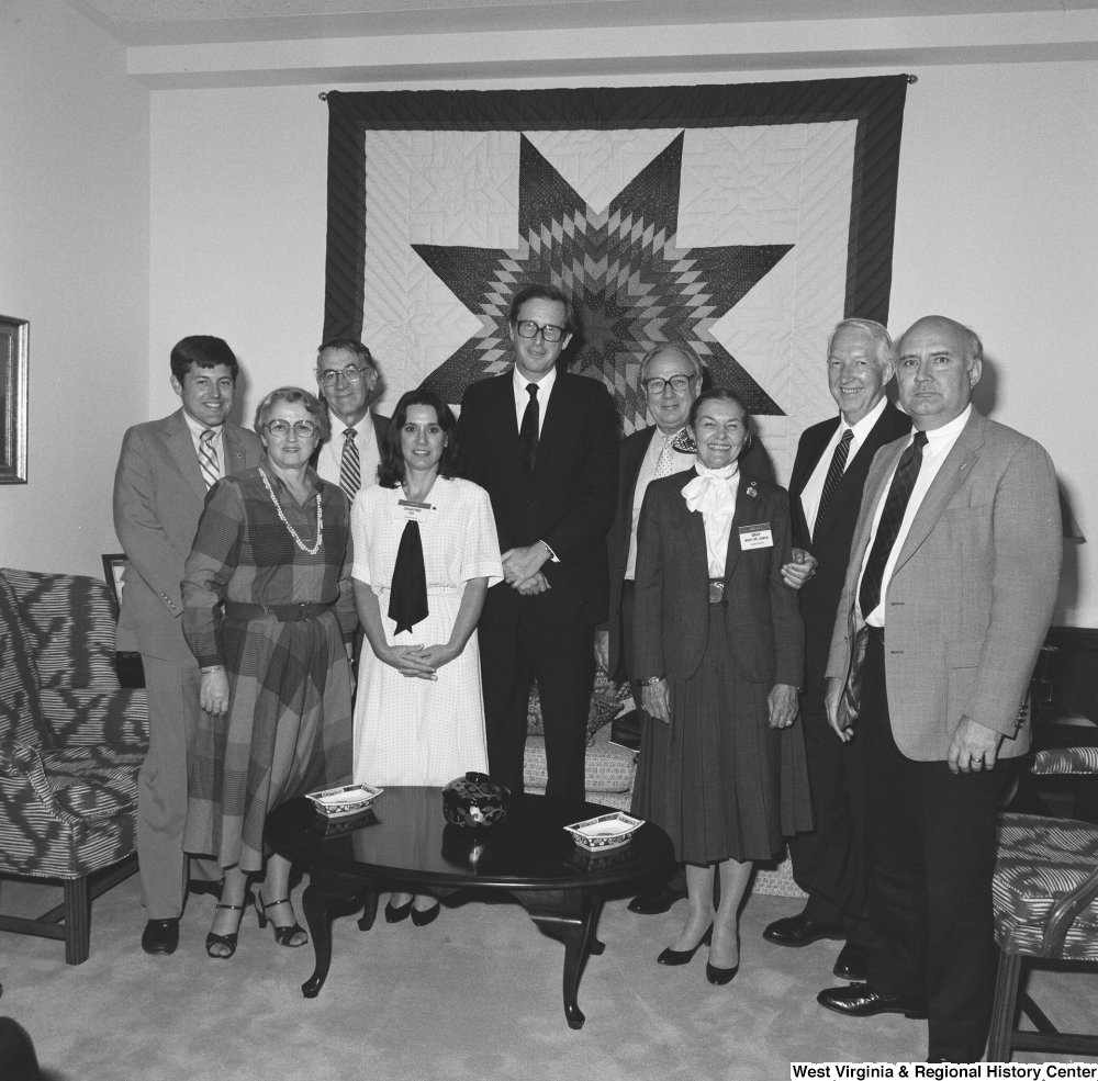 ["Senator John D. (Jay) Rockefeller stands with representatives from the West Virginia State Medical Association in his Washington office."]%