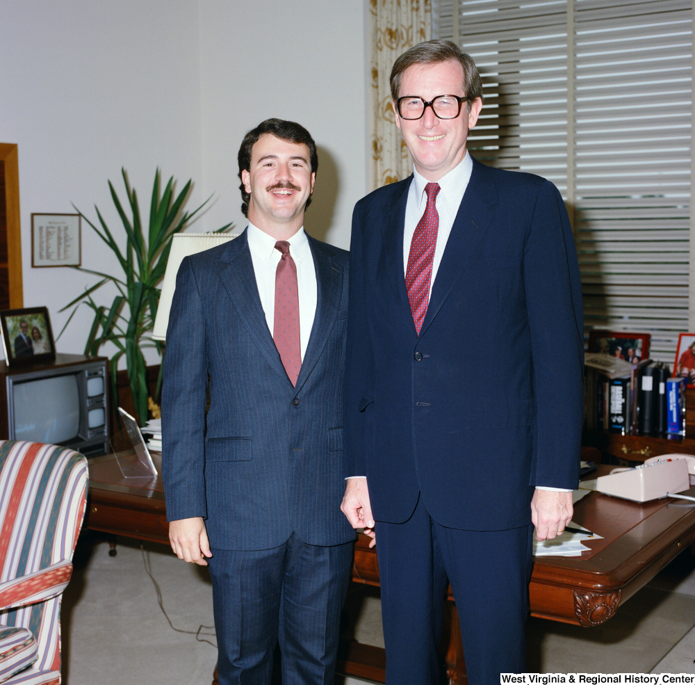 ["This color photograph shows Senator John D. (Jay) Rockefeller with an unidentified man in his office."]%