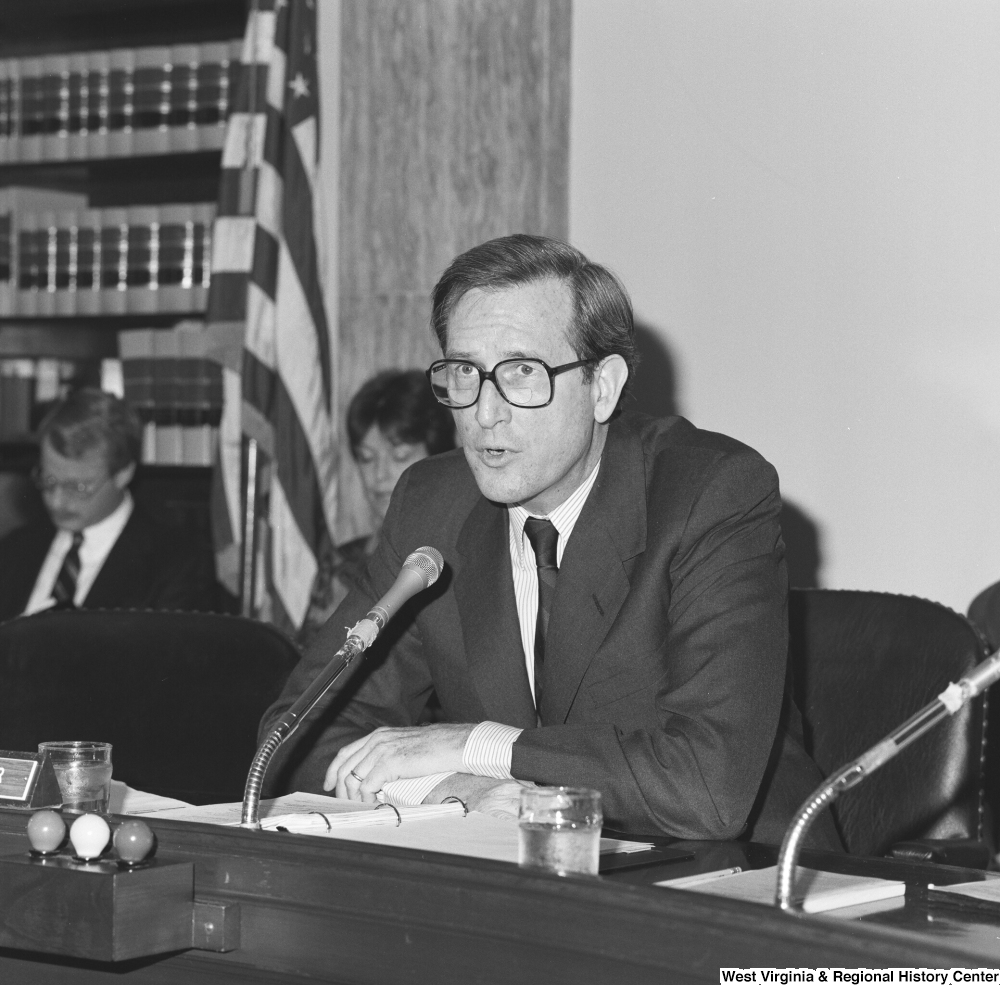 ["Senator John D. (Jay) Rockefeller speaks at a committee hearing."]%