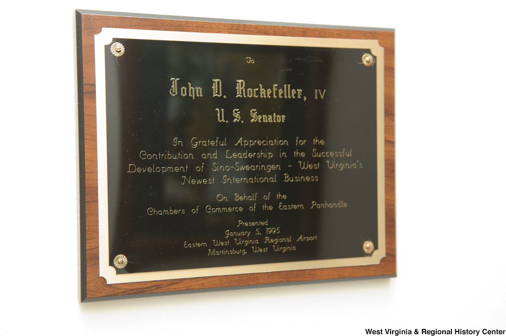 ["\"To John D. Rockefeller, IV, U.S. Senator, In grateful appreciation for the contribution and leadership in the successful development of Sino-Swearingen - West Virginia's newest international business, on behalf of the Chambers of Commerce of the Eastern Panhandle.\""]%