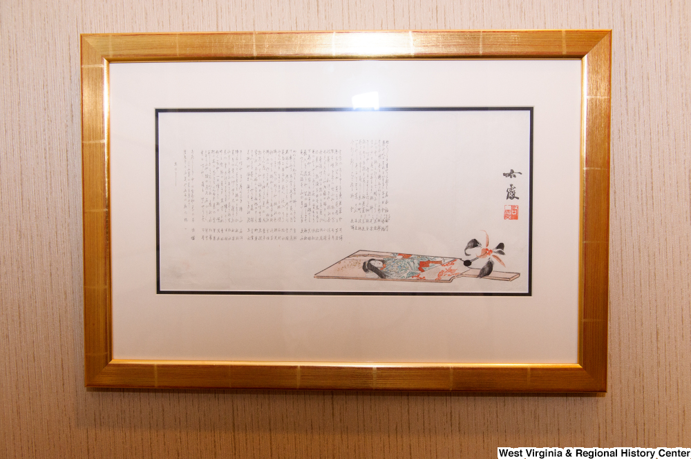 ["Japanese character writing hangs on the wall in Senator Rockefeller's office."]%