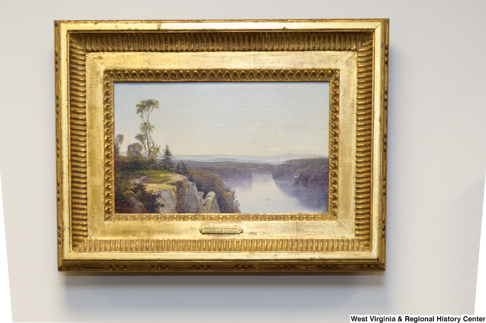["A painting of a waterfall hangs in Senator Rockefeller's office."]%