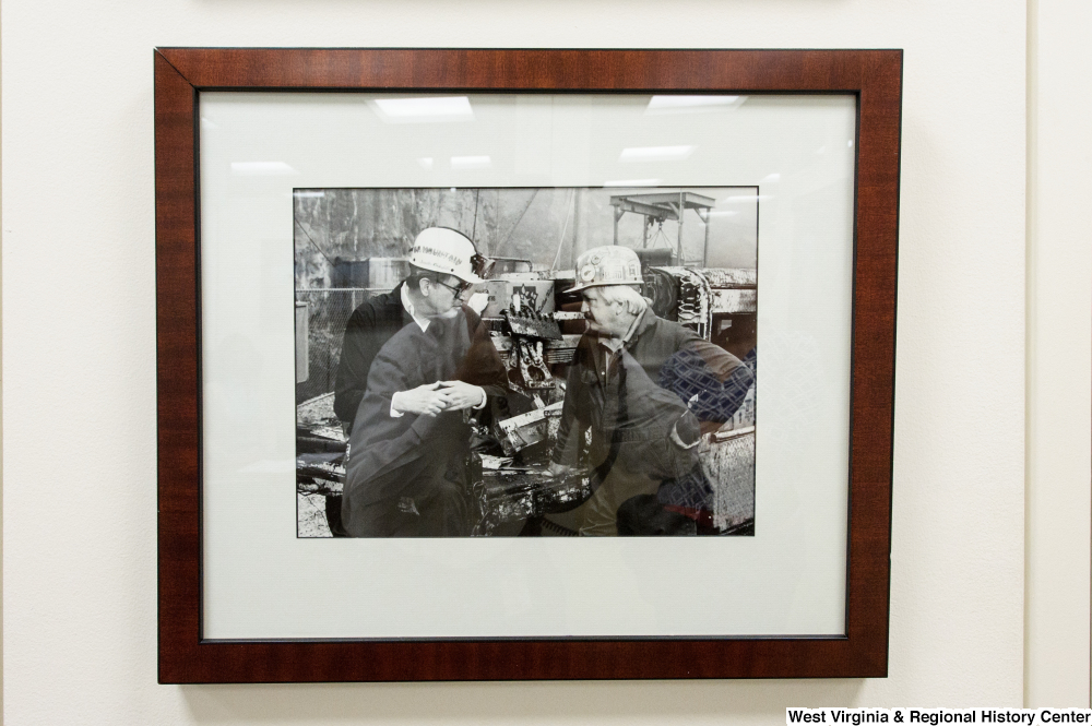 ["Senator John D. (Jay) Rockefeller speaks with a West Virginia coal miner."]%