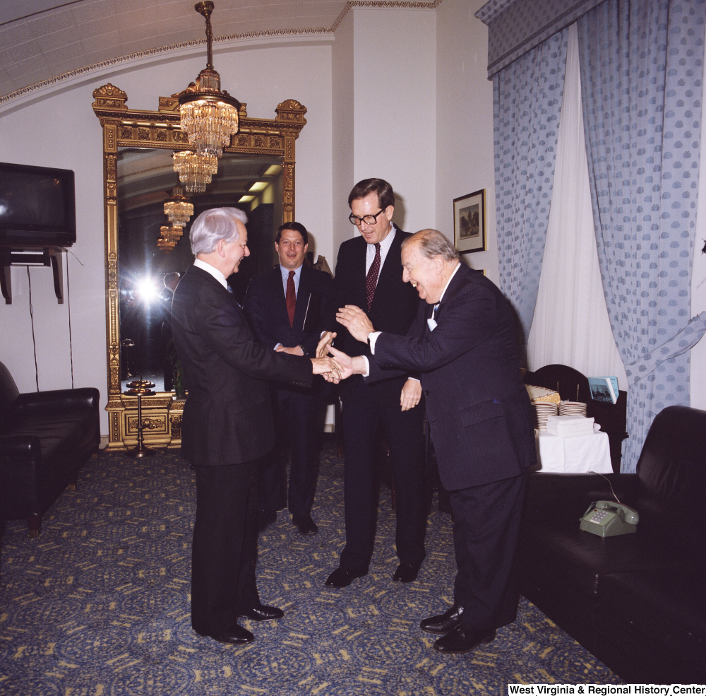 ["Senator John D. (Jay) Rockefeller, Senator Al Gore, and former Senator Jennings Randolph greet Senator Robert C. Byrd on his birthday."]%