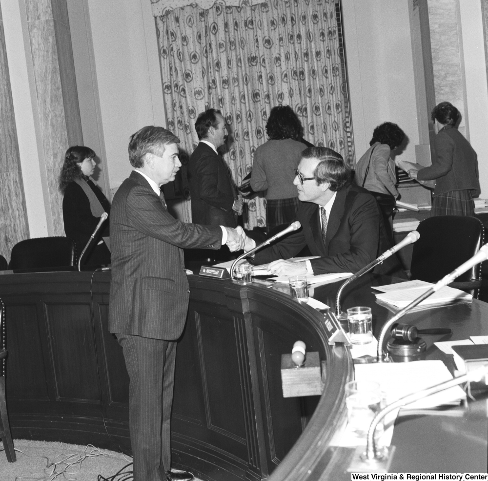 ["Senator John D. (Jay) Rockefeller shakes hands with the mayor of Nitro, West Virginia following a Senate Commerce Committee hearing. The mayor was invited to testify about how liability insurance was hurting towns and counties throughout West Virginia."]%