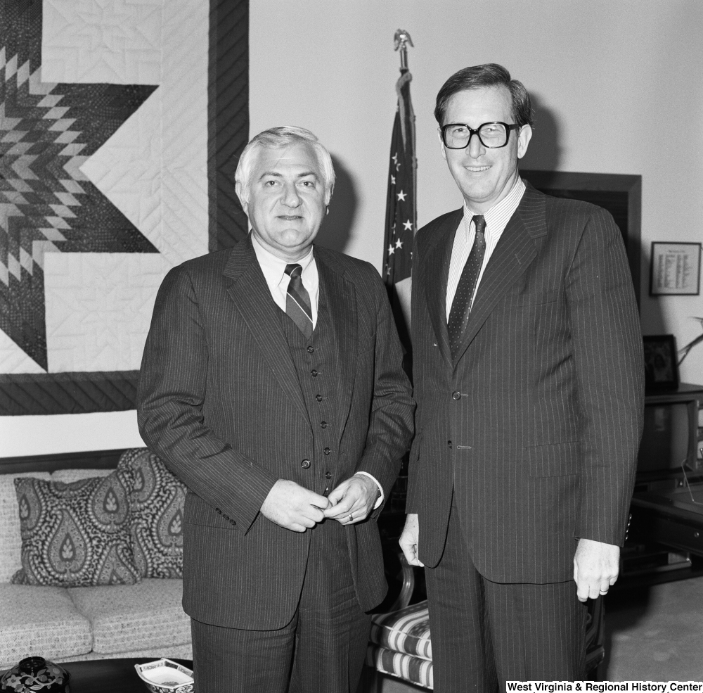 ["Senator John D. (Jay) Rockefeller poses for a photograph with Orson Swindle, the head of the Economic Development Administration."]%