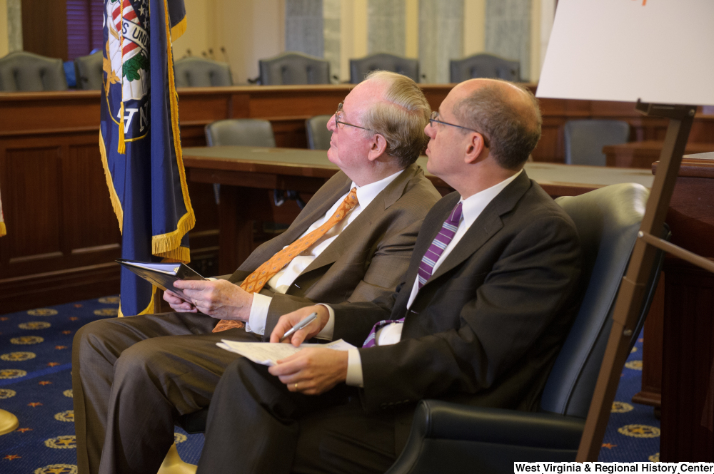 ["Senator John D. (Jay) Rockefeller sits next to a man at a Commerce Committee event called Protecting Kids' Privacy Online."]%